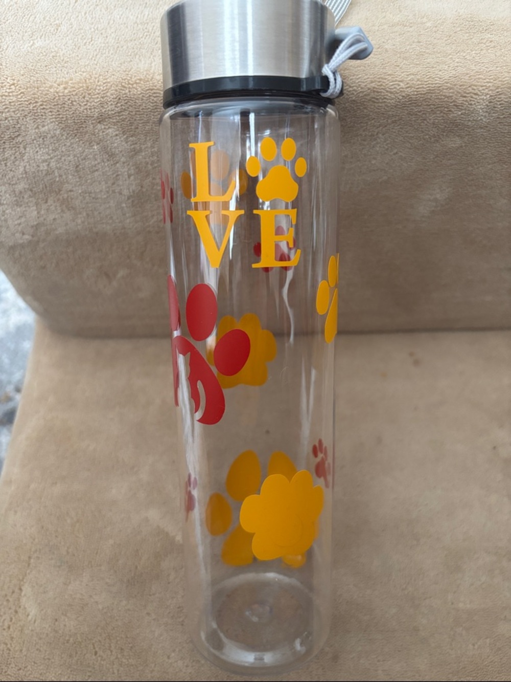 Clear Paw-Print Water Bottle with Yellow and Red Accents (Plastic)
